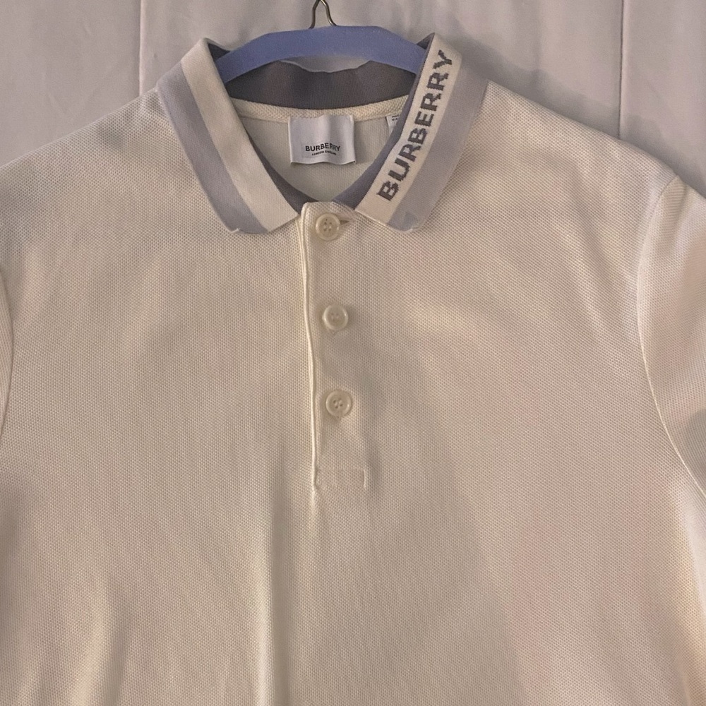 Burberry cream polo Sz Small.